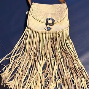 Original Spell Cream Muse Crossbody Bag with Fringe and Buckle